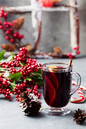 Mulled red wine with spices, orange slices on grey stone new year and Christmas background Photographie de stock - Aubaine LD & Abonnement, Code: 400-08428344