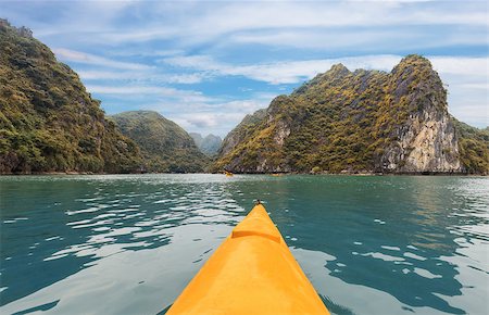 simsearch:400-05362222,k - Yellow kayak on turquoise sea water amongst the rocks of Halong Bay Stock Photo - Budget Royalty-Free & Subscription, Code: 400-08428418