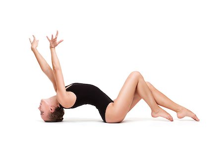 simsearch:400-05916816,k - Full body portrait of young slender gymnastic woman in black swimsuit isolated on white background Stock Photo - Budget Royalty-Free & Subscription, Code: 400-08428450