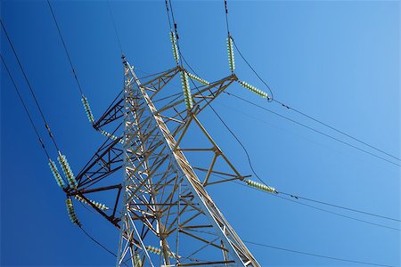 simsearch:400-04873092,k - High-voltage electricity pylon against blue sky. Electric power transmission. Foto de stock - Super Valor sin royalties y Suscripción, Código: 400-08428688