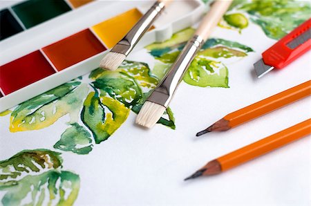 Watercolor paints and brushes with the sample drawings Stockbilder - Microstock & Abonnement, Bildnummer: 400-08428842