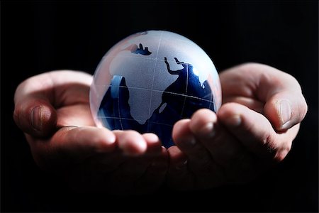 glass globe in hand Stock Photo - Budget Royalty-Free & Subscription, Code: 400-08429158
