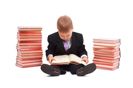 simsearch:400-08429355,k - Boy with books for an education portrait - isolated over a white background Photographie de stock - Aubaine LD & Abonnement, Code: 400-08429168