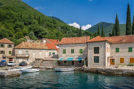 steffus (artist) - Montenegrian traditional style fisherman's village with wooden boats. Touristic places of Montenegro. Fotografie stock - Microstock e Abbonamento, Codice: 400-08429200