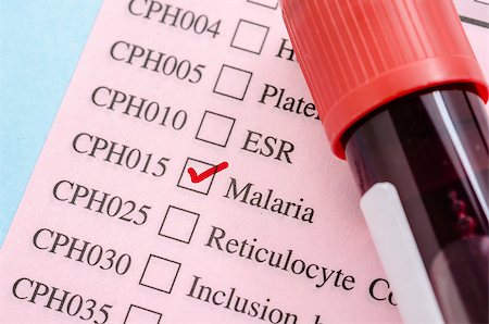 subtropical - Sample blood tube on Malaria test form paper in laboratory. Stock Photo - Budget Royalty-Free & Subscription, Code: 400-08429270