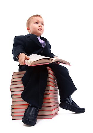 simsearch:400-08429355,k - Boy with books for an education portrait - isolated over a white background Photographie de stock - Aubaine LD & Abonnement, Code: 400-08429354