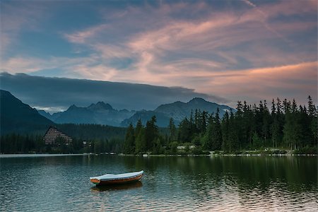 simsearch:400-04412215,k - Beautiful landscape with boats on a lake surrounded by high mountains, Štrbské Pleso Photographie de stock - Aubaine LD & Abonnement, Code: 400-08429999