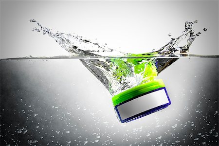 Image of a plastic box with water splash, babbules and free space Stock Photo - Budget Royalty-Free & Subscription, Code: 400-08430257
