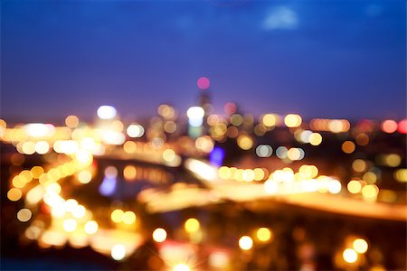 City Lights at Night. Blurred Photo with Bokeh. Abstract Urban Background. Fotografie stock - Microstock e Abbonamento, Codice: 400-08430418