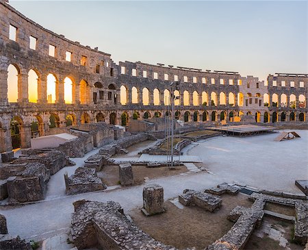 round amphitheatre - Inside of Ancient Roman Amphitheater in Pula, Croatia, Famous Travel Destination, in Sunny Summer Evening Stock Photo - Budget Royalty-Free & Subscription, Code: 400-08430419