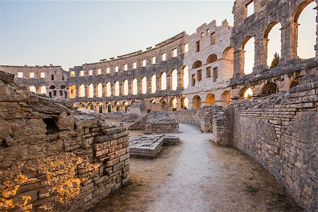 simsearch:400-04572284,k - Inside of Ancient Roman Amphitheater in Pula, Croatia, Famous Travel Destination, in Sunny Summer Evening Stock Photo - Budget Royalty-Free & Subscription, Code: 400-08430746