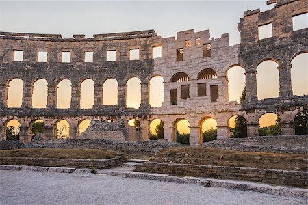 round amphitheatre - Inside of Ancient Roman Amphitheater in Pula, Croatia, Famous Travel Destination, in Sunny Summer Evening Stock Photo - Budget Royalty-Free & Subscription, Code: 400-08430943