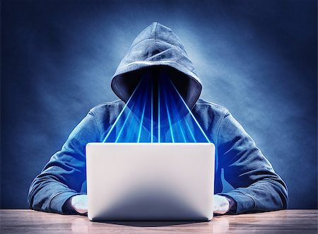 stalker - picture of an hacker on a laptop Stockbilder - Microstock & Abonnement, Bildnummer: 400-08430956