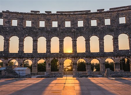 round amphitheatre - Inside of Ancient Roman Amphitheater in Pula, Croatia, Famous Travel Destination, in Sunny Summer Evening Stock Photo - Budget Royalty-Free & Subscription, Code: 400-08431150