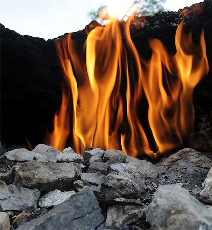 simsearch:400-08431318,k - Natural fire on Chimera Mount. Flaming rock (Yanartas )  is generally believed to be the ancient Mount Chimera ( Antalya, Turkey). The wonder-fires have been burning for at least 2500 years. Photographie de stock - Aubaine LD & Abonnement, Code: 400-08431309