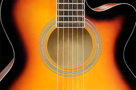 Six-string guitar full face close up on a black background Stockbilder - Microstock & Abonnement, Bildnummer: 400-08431326