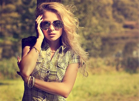 simsearch:400-08430017,k - Trendy Hipster Girl in Sunglasses Touching Her Face. Summer Modern Youth Lifestyle. Toned Photo. Stock Photo - Budget Royalty-Free & Subscription, Code: 400-08431553