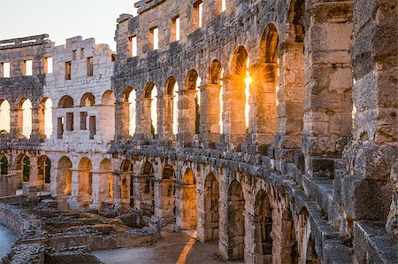round amphitheatre - Architecture Details of the Roman Amphitheater Arena in Sunny Summer Evening. Famous Travel Destination in Pula, Croatia. Stock Photo - Budget Royalty-Free & Subscription, Code: 400-08431693