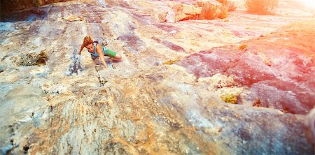 simsearch:400-08072896,k - female rock climber climbs on a rocky wall Foto de stock - Royalty-Free Super Valor e Assinatura, Número: 400-08431878