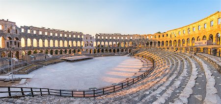 round amphitheatre - Inside of Ancient Roman Amphitheater in Pula, Croatia, Famous Travel Destination, in Sunny Summer Evening Stock Photo - Budget Royalty-Free & Subscription, Code: 400-08431900