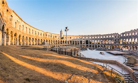 round amphitheatre - Inside of Ancient Roman Amphitheater in Pula, Croatia, Famous Travel Destination, in Sunny Summer Evening Stock Photo - Budget Royalty-Free & Subscription, Code: 400-08432081