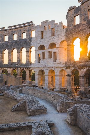 round amphitheatre - Inside of Ancient Roman Amphitheater in Pula, Croatia, Famous Travel Destination, in Sunny Summer Evening Stock Photo - Budget Royalty-Free & Subscription, Code: 400-08432366