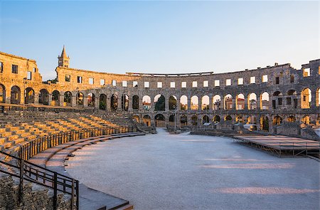 round amphitheatre - Inside of Ancient Roman Amphitheater in Pula, Croatia, Famous Travel Destination, in Sunny Summer Evening Stock Photo - Budget Royalty-Free & Subscription, Code: 400-08432548