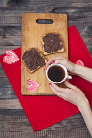 Toast with chocolate paste. Romantic breakfast on Valentine's Day Stock Photo - Budget Royalty-Free & Subscription, Code: 400-08432912