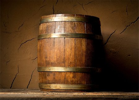 Wooden cask near clay wall in cellar Stock Photo - Budget Royalty-Free & Subscription, Code: 400-08433088