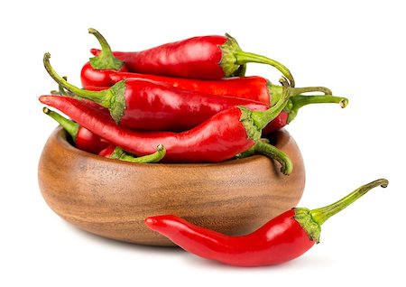 simsearch:400-07211737,k - Red hot chili peppers in wooden bowl on white background Photographie de stock - Aubaine LD & Abonnement, Code: 400-08433335