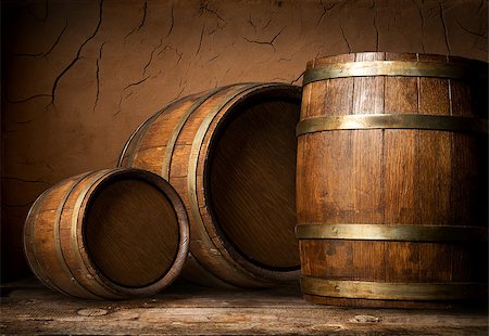 Three wooden barrels near clay wall in cellar Stock Photo - Budget Royalty-Free & Subscription, Code: 400-08433389