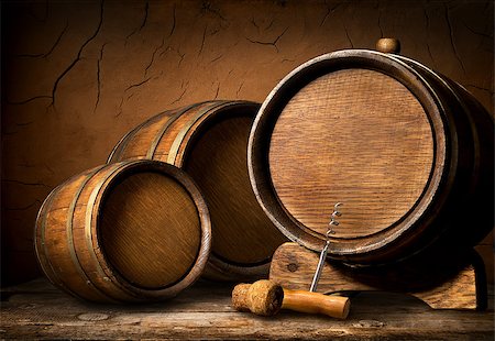 simsearch:400-08433088,k - Wooden barrels and corkscrew in clay cellar Foto de stock - Royalty-Free Super Valor e Assinatura, Número: 400-08433383