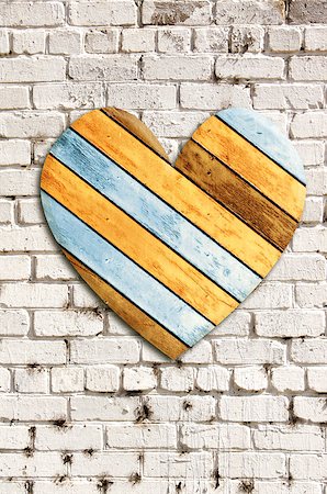 stucco sign - Wooden heart on old brick wall painted with white paint Stock Photo - Budget Royalty-Free & Subscription, Code: 400-08433712