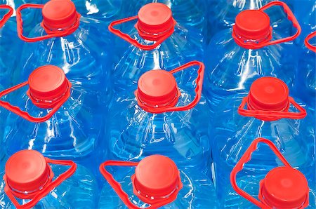 Several large blue plastic water bottles Stockbilder - Microstock & Abonnement, Bildnummer: 400-08494716