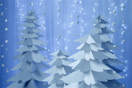 shyrix (artist) - Christmas trees made of paper on blue background. Stockbilder - Microstock & Abonnement, Bildnummer: 400-08494873
