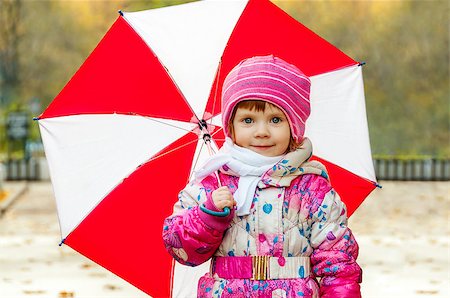rain little girl - Portrait of a little girl with an umbrella Photographie de stock - Aubaine LD & Abonnement, Code: 400-08494902