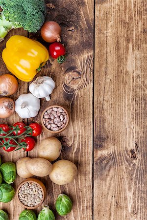 simsearch:400-08495123,k - Fresh and healthy organic vegetables and food ingredients on wooden background Stock Photo - Budget Royalty-Free & Subscription, Code: 400-08495115