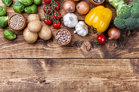 simsearch:400-08495123,k - Fresh and healthy organic vegetables and food ingredients on wooden background Stock Photo - Budget Royalty-Free & Subscription, Code: 400-08495116