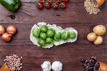simsearch:400-08495123,k - Fresh and healthy organic vegetables and food ingredients on wooden background Stock Photo - Budget Royalty-Free & Subscription, Code: 400-08495122