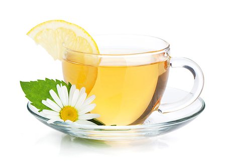 simsearch:400-08186432,k - Cup of tea with lemon slice, mint leaves and chamomile flower. Isolated on white background Stock Photo - Budget Royalty-Free & Subscription, Code: 400-08495333