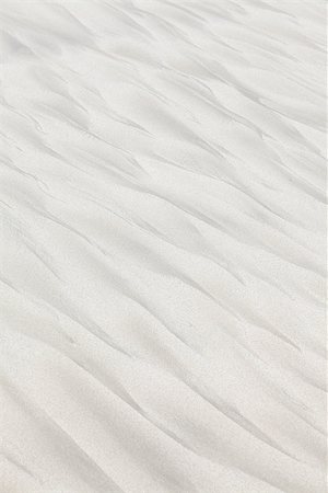 Strange wave-like patterns on the beach sand Stock Photo - Budget Royalty-Free & Subscription, Code: 400-08496725