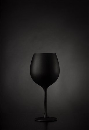 Black glass of wine on black background Stock Photo - Budget Royalty-Free & Subscription, Code: 400-08496822