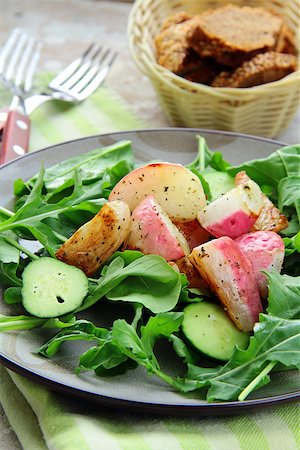 simsearch:400-06485512,k - fresh healthy salad with radish, cucumber and arugula Stock Photo - Budget Royalty-Free & Subscription, Code: 400-08497160