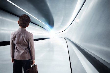futuristic boy kid - Kid with luggage walks in futuristic tunnel Stock Photo - Budget Royalty-Free & Subscription, Code: 400-08497227