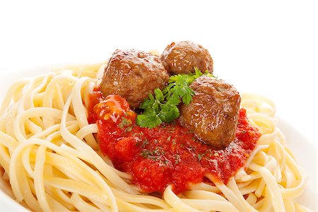 Pasta with tomato sauce and meatballs. Traditional mediterranean eating. Stock Photo - Budget Royalty-Free & Subscription, Code: 400-08497478