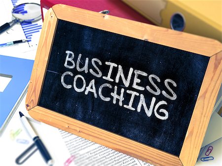 simsearch:400-08998421,k - Handwritten Business Coaching on a Chalkboard. Composition with Chalkboard and Ring Binders, Office Supplies, Reports on Blurred Background. Toned Image. 3d Render. Foto de stock - Super Valor sin royalties y Suscripción, Código: 400-08497789