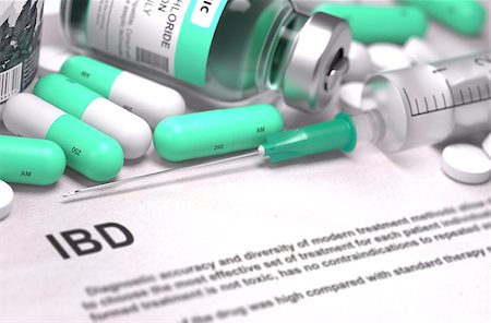 simsearch:400-08376875,k - Diagnosis - IBD - Inflammatory Bowel Disease. Medical Concept with Light Green Pills, Injections and Syringe. Selective Focus. Blurred Background. 3d Render. Stock Photo - Budget Royalty-Free & Subscription, Code: 400-08497821