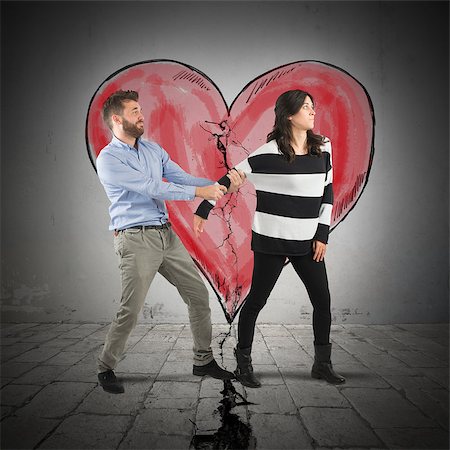 simsearch:400-08338944,k - Boy pulling a girl with broken heart Stock Photo - Budget Royalty-Free & Subscription, Code: 400-08498148