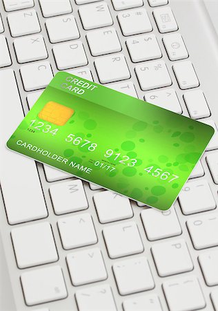 simsearch:400-04994290,k - green plastic debit card  on modern keyboard - internet shopping concept Fotografie stock - Microstock e Abbonamento, Codice: 400-08498222