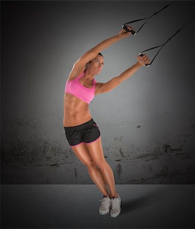 simsearch:400-08505882,k - Woman fitness instructor training with the TRX Stock Photo - Budget Royalty-Free & Subscription, Code: 400-08491880